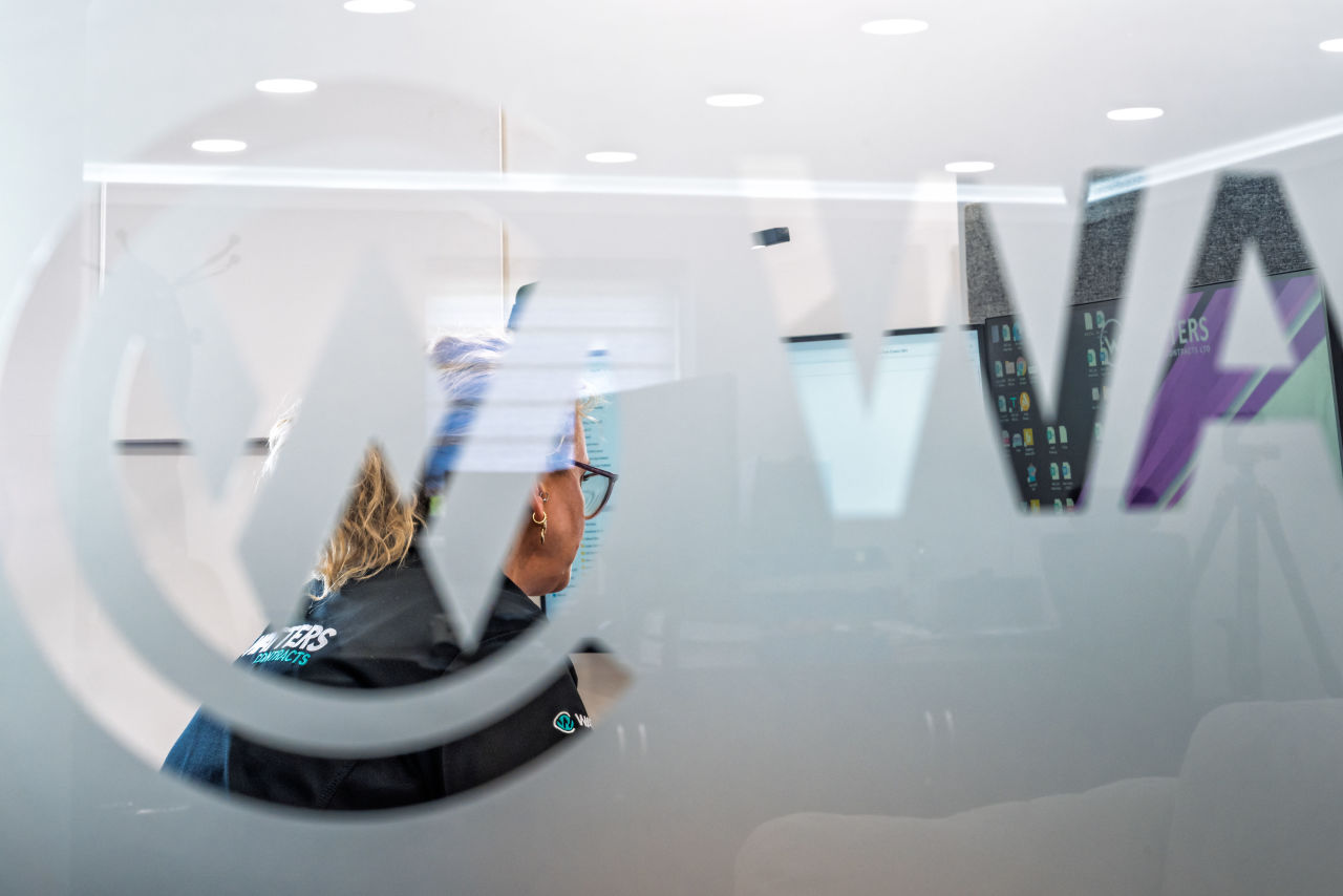 Watters Contracts employee working in the office